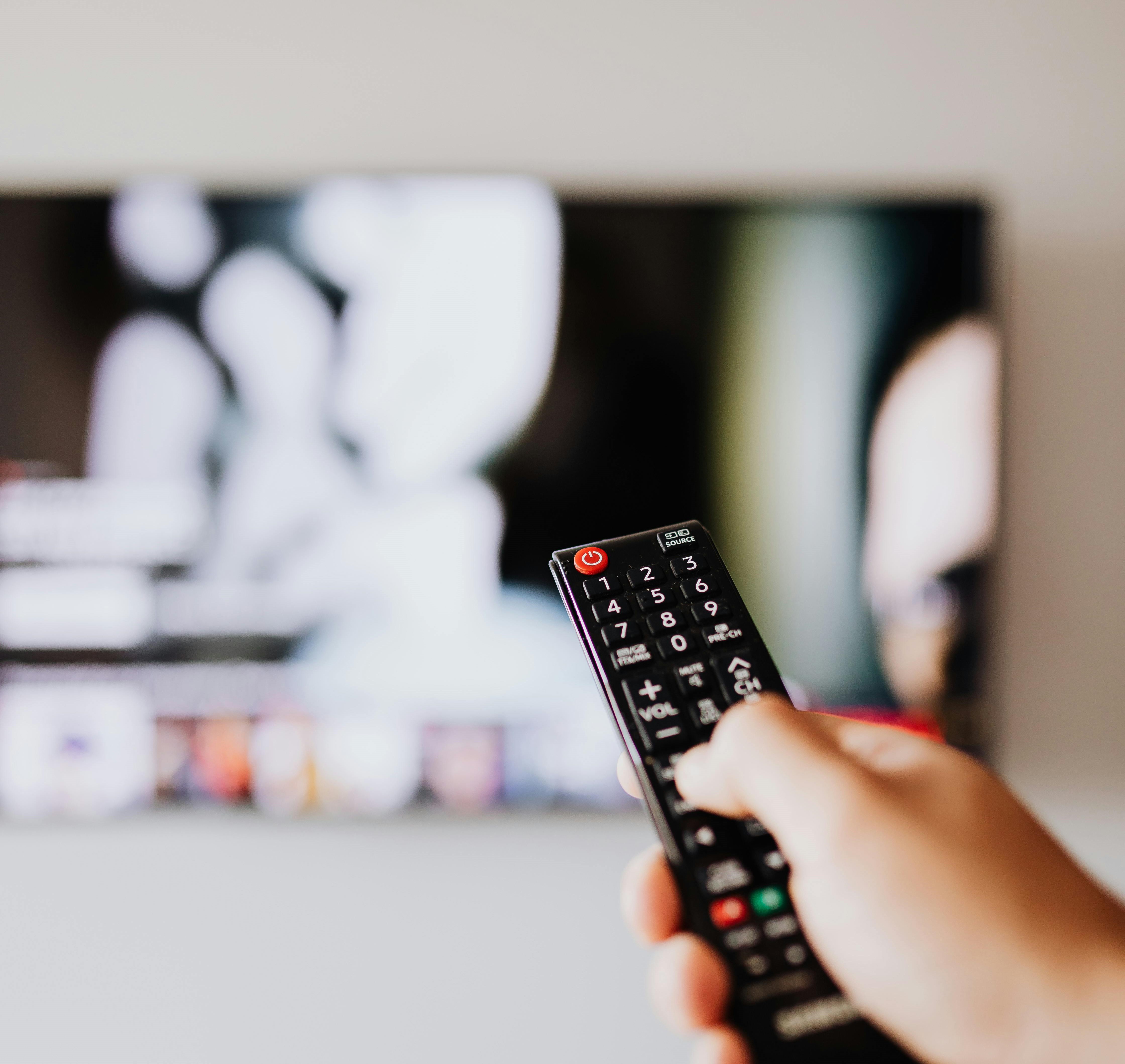 Does television decide who's important in society?